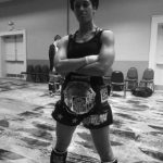 Brandon Richey Fitness strength student Victoria Debroux showing off her Women's IKF National title belt after training for weeks with my fitness programs 